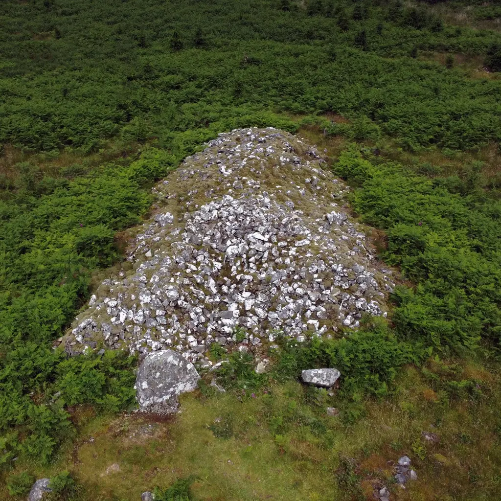 A drone shot of the cairn at Knockman Woods.